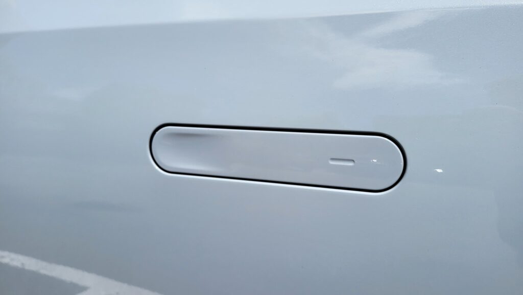 R1 refresh update includes a new dimple and indentation on the door handle to assist with figuring out how to open the door