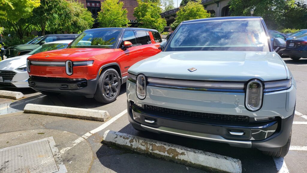 Refreshed 2025 Rivian R1S in Canyon Red and Limestone R1S